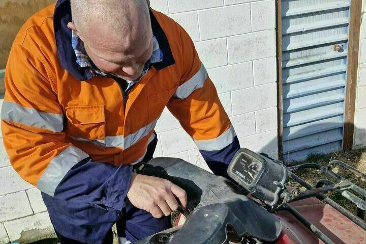 Maintenance on an ATV